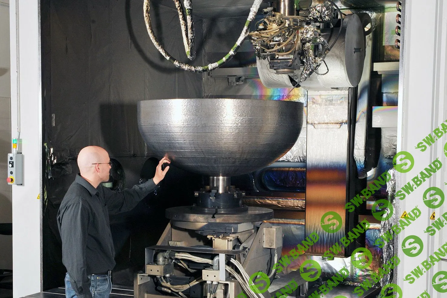 В США на 3D-принтере впервые напечатали титановую деталь для спутника